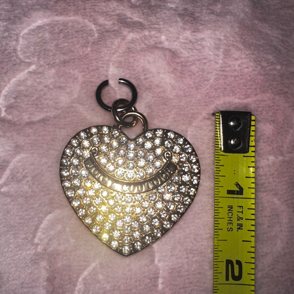 Juicy Couture vintage heart bag charm.